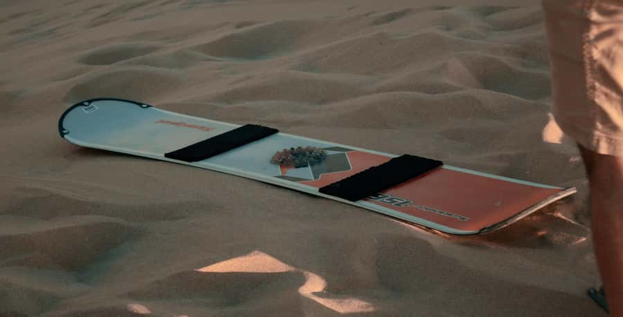 Agadir/Taghazout: Sandboarding & Sunset Tea with Fire Show - Sandboarding on the golden dunes
