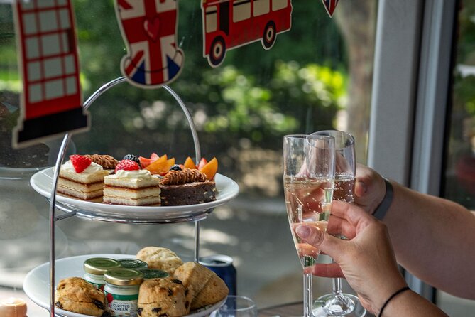 Buckingham Palace & Afternoon Tea Sightseeing Tour with PG Tips - The palace route, café, gardens, and gift shop
