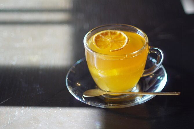 Discover Japanese Tea Blending Techniques in Osaka - Traditional sweets and a calm tea-house setting