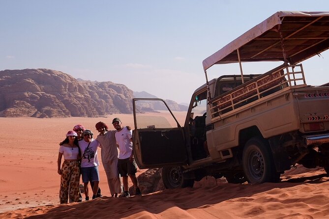 Half day Jeep Tour in Wadi Rum incl. water and Bedouin tea - Red Sand Dune views and Bedouin tea