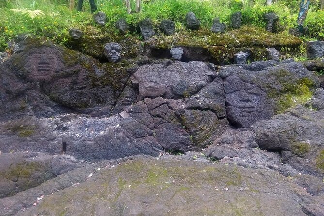 Hawaiian Tikis and Guava Tea - Lava rock sculptures and the Rasta stone figure