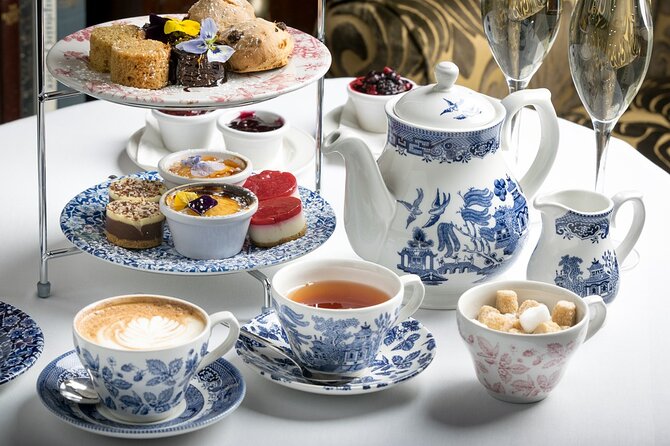 High Tea Experience at Burj Al Arab with Pickup and Drop off - Sahn Eddar or Skyview Bar?