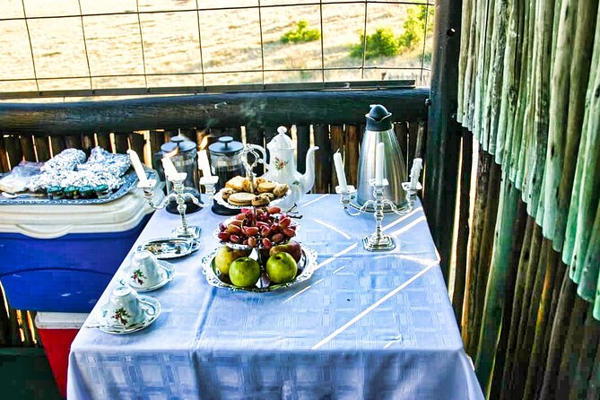 High Tea in the Savannah, Catering by Victoria Falls Hotel - The sunset drive back to Victoria Falls