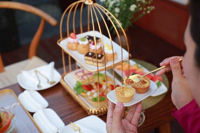 Huong River Afternoon Tea Cruise Tour Along Hue City - What the small group and boat setup mean