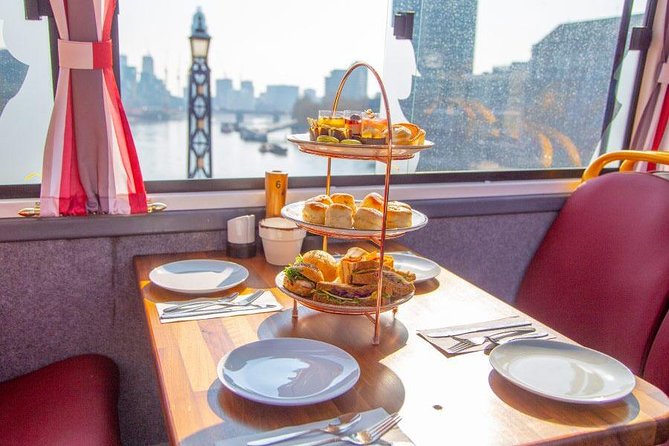 London Afternoon Tea Bus and Panoramic Tour on Lower Deck - Buckingham Palace from a moving bus