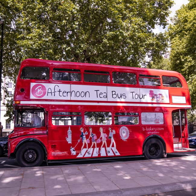London: Afternoon Tea Sightseeing Bus Tour - Settling into the decorated double-decker