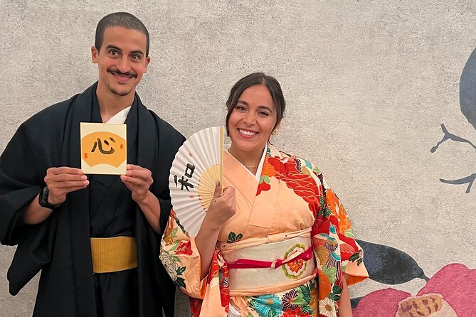 Osaka: Tea Ceremony, Calligraphy, and Kimono Experience - Calligraphy with a brush and a keepsake