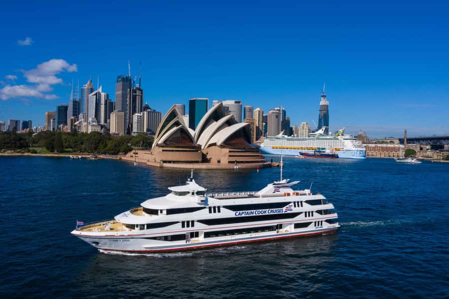 Sydney: Relaxing High Tea Cruise on Sydney Harbour - Sydney Harbour views with a teapot and champagne glass