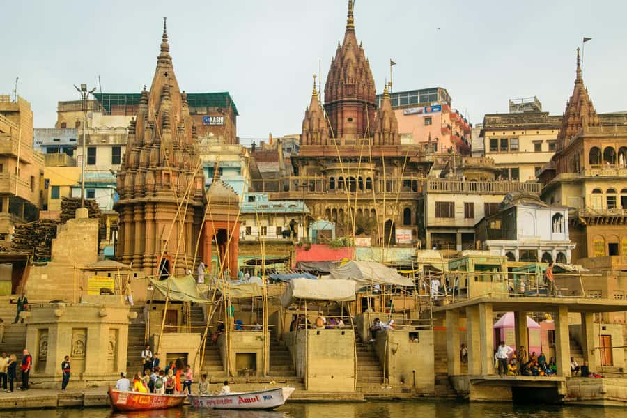 Varanasi: Sunrise walking tour with Chai & Arti Ceremony - Manikarnika Ghat: approach with respect